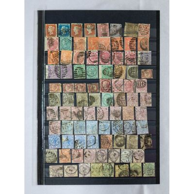 a framed picture of a collection of stamps on a white background