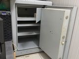 an image of a kitchen with an open safe door