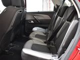 a red car with black seats in the back of it