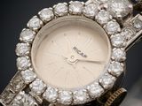 an image of a close up of a wrist watch with diamonds on it