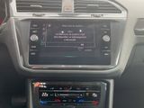 the dashboard of a car with a car radio in the center of it