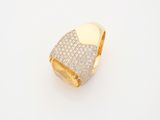 a yellow gold ring with diamonds on a white background