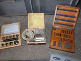 a lot of tools that are sitting on the floor