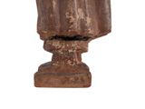 a statue of a man with a hat on it ' s head