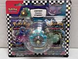 a box of pokemon toys on a white surface