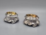 pair of silverplated candlesticks with lion heads on each side