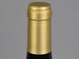 a bottle of wine that is sitting on a table