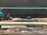 a table with a lot of tools on top of it