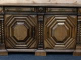 a wooden cabinet that has two doors on it