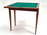a small table with a green top on a white background