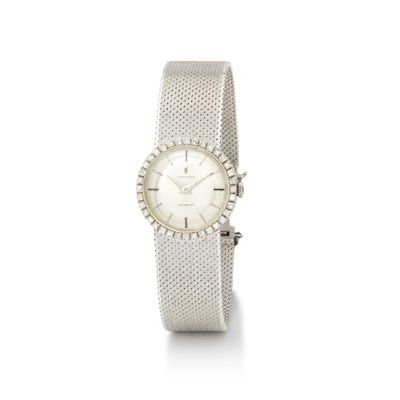 an image of a woman ' s wrist watch on a white background