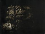une vieille photo en noir et blanc représentant un chien avec une pelote de laine