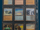 a lot of cards that are in a binder