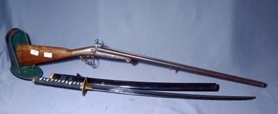 two different types of weapons that are on display