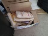 a cardboard box that has some items in it