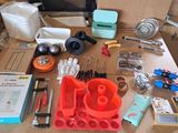 a table with a lot of tools and supplies on it