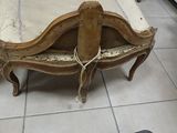 a couch that is sitting in a room next to a table