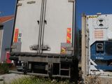 a truck that is parked in front of a building