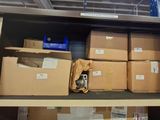 many boxes on the shelf in the room