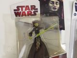 two star wars action figures sit side by side on a white surface