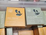 many boxes of soaps in a plastic container