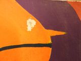 a painting of an orange and purple bird on the wall