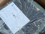 a box with a piece of paper in it that is wrapped in plastic