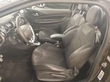 a picture of the interior of a car with the door open