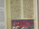 an open book with a picture of a man riding a horse
