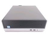 the front of a small computer with a keyboard on top of it