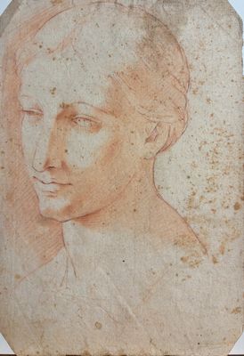 an image of a drawing of a woman ' s face on a piece of paper