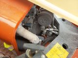 a close up of a machine that is sitting on the ground