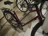 two bikes parked next to each other in a room