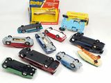 many toy cars that are sitting on a table