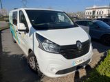 a white van that is parked on the side of the road