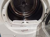 a washing machine that is sitting on a pallet