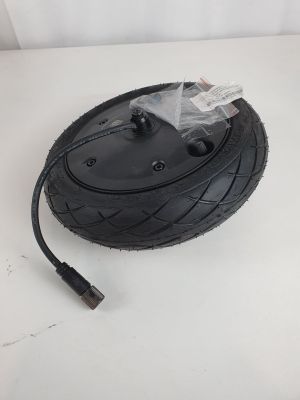a close up of a tire with a cable connected to it