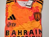 un t-shirt avec l'image d'un footballeur dessus