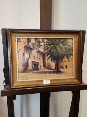 une peinture représentant un palmier devant un immeuble