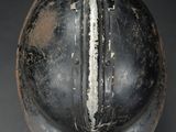 a close up of a helmet on a table