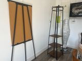 a picture of a room with a easer and a picture on the wall