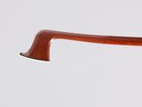 a close up of a pair of glasses with a wooden handle