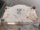 a white plate with a blue and white design on it