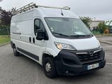 a picture of a white van parked in a parking lot