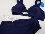 a close up of a bikini and panties on a table