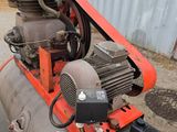 a small engine that is sitting on top of a pipe