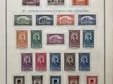an old picture of a collection of stamps with a picture of a man and a woman