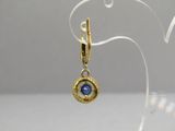 an image of a pair of gold earrings with a blue stone