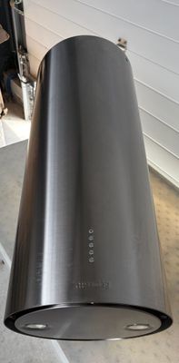 a large metal tube that is sitting on the floor