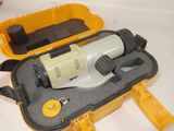 a yellow case with a white and black object in it